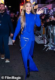 93638333-14241003-Rita_Ora_34_turned_heads_as_she_donned_three_different_ensembles-m-257_1735716674556.jpg