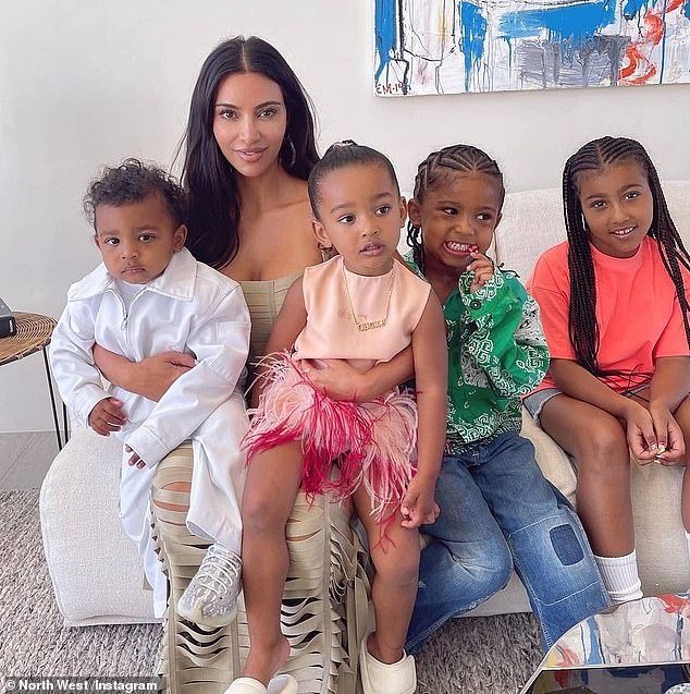 94047401-14260031-Kanye_West_s_ex_Kim_Kardashian_and_their_four_children_Psalm_Chi-a-1_1736813710757.jpeg