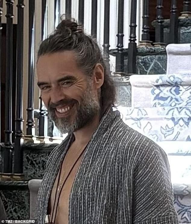96940575-14574225-Actor_and_comedian_Russell_Brand_has_been_spotted_in_public_for_-a-1_1743839674367.jpeg