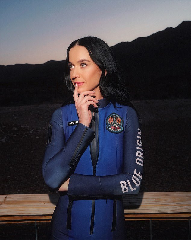 97233853-14605365-If_Katy_Perry_had_any_doubts_about_going_into_space_tomorrow_wit-a-102_17445880762.jpeg