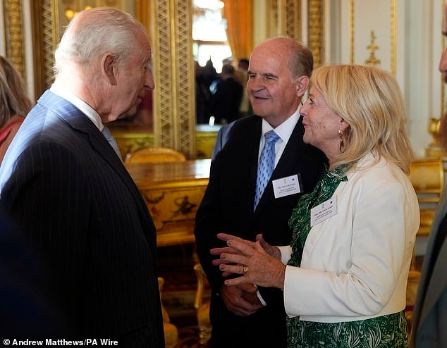 97881219-0-King_Charles_speaks_with_Alistair_and_Heather_James_the_parents_-a-21_1746047274017.jpg
