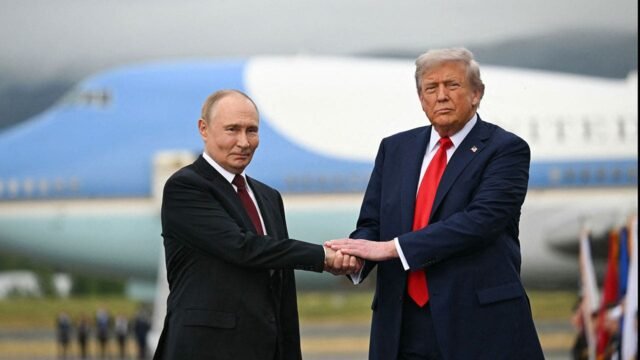trump-and-putin-greet.jpg