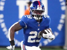 Agregue el corredor de los Gigantes, Tyrone Tracy Jr.
