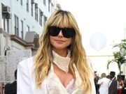 Heidi Klum acelera el pulso mientras muestra su sujetador de encaje y ropa interior con un vestido transparente en Vogue World