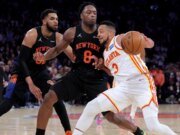 Calificación de la decisión de los Atlanta Hawks de volver a contratar a C.J. McCollum con un contrato de un año