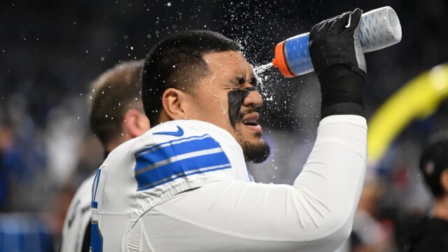 Penei-Sewell-with-water-bottle-df342a79bda30fd423817e9bc0b7152d.jpg