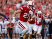 Lo que el traslado de Carter Nelson, nativo de Nebraska, al puesto podría significar para el Gran Rojo