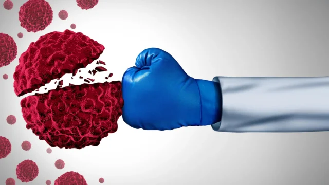 cancer-vaccine-fight-punch-boxing-glove-scientist.webp.webp
