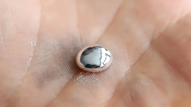 hand-holding-liquid-gallium.webp.webp